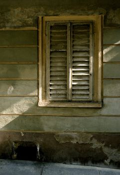 light strip over old window shutter