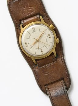 old wrist-watch with leather strap