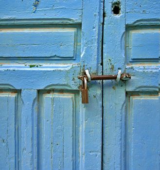 padlock on blue door