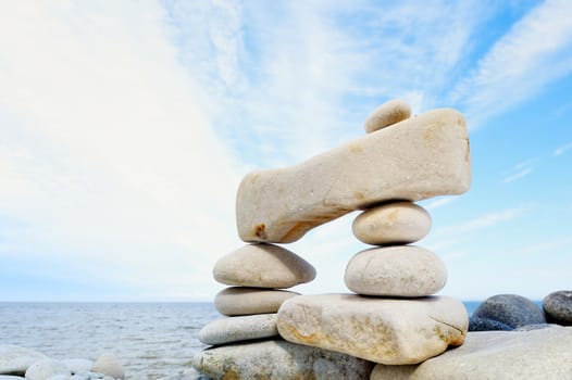 Some small pebbles are connected with a large stone