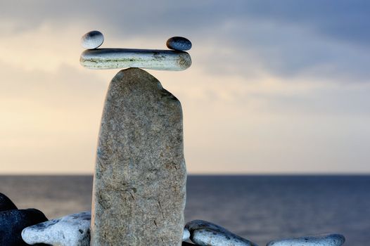 Pebbles in balancing on the sea coast