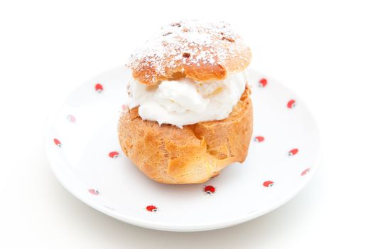 A cream puff on the white background
