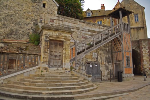 Building with circular stair in Honfleur's old city in Normandy, France