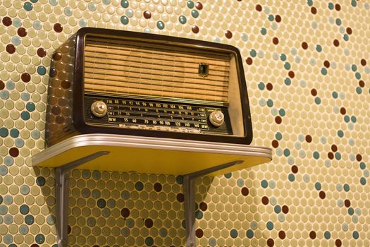 vintage radio on yellow background 