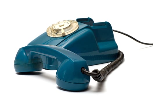 Old  dial telephones with removed  receiver isolated on a white background.