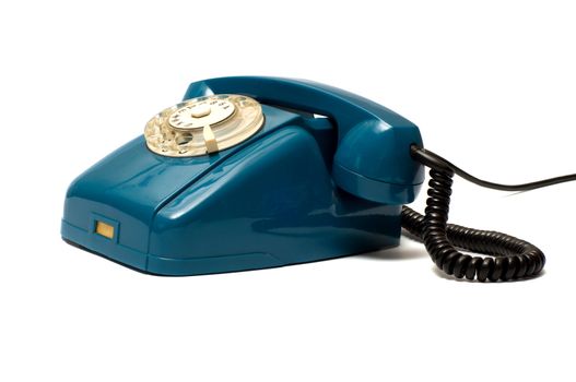 Green vintage telephone on white background