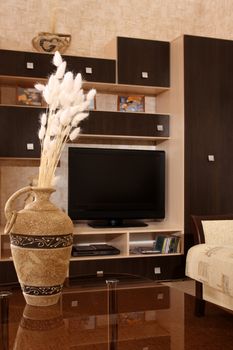 Studio photographing of an interior of a living room

