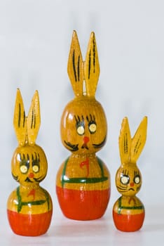 three old russian easter bunnies in different sizes