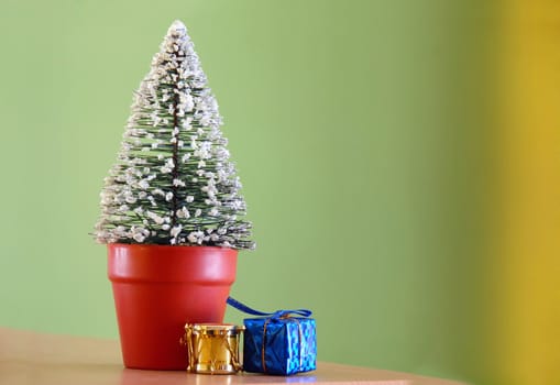 small christmas gifts in arms isolated on white