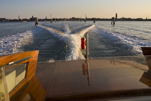 View from a water taxi leaving Venice in Italy
