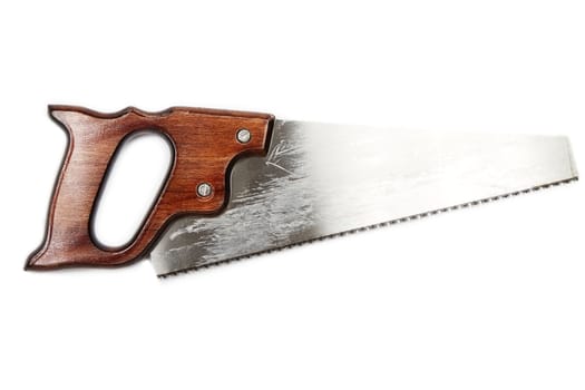a handsaw with wooden hand grip on white background