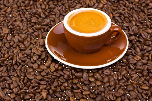 espresso cup and coffee beans on white background