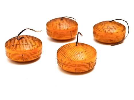 four brown china candles with tall wick