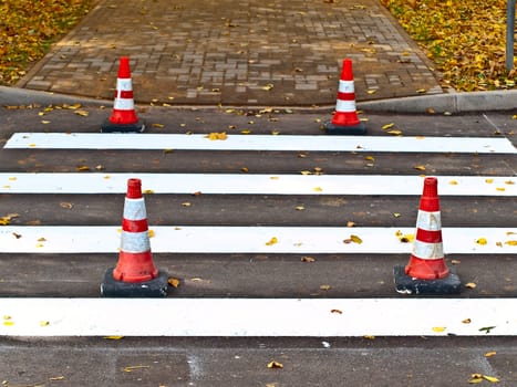 crosswalk repair in autumn time
