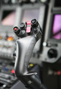 Control stick in cockpit of police helicopter