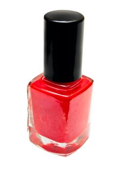 bottle of the red nail polish over the white background