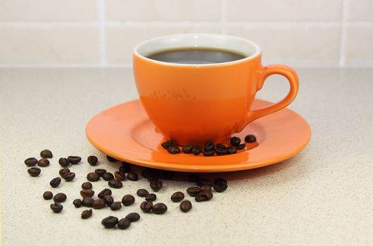 Cup of coffee on kitchen table 