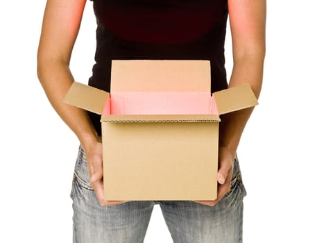 Woman holding a heavy cardboard box isolated on white background