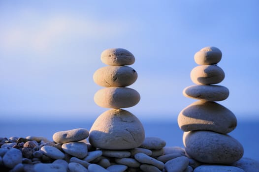 Balancing by two piles near the sea