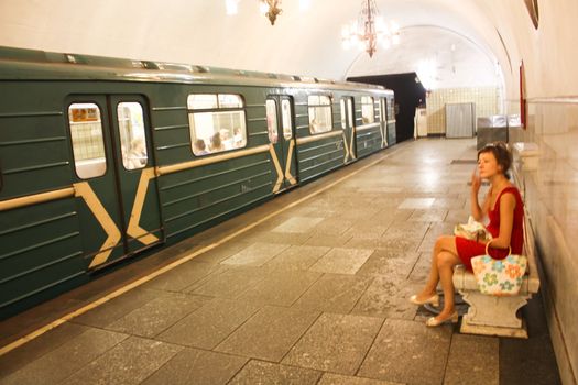 Girl in a subway. Russia Moscow.
