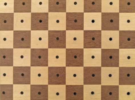 The chessboard in brown and white without 	chessmen