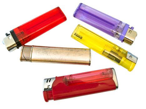 Some isolated multicolored lighters against the white background 