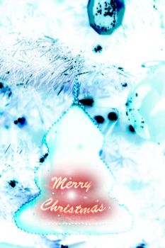 hanging tree shaped christmas decoration in blue
