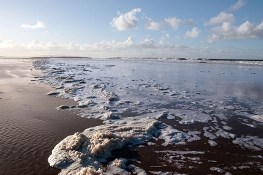 the waves crashing in on ballybunion beach ireland