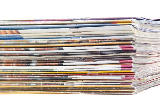 stack of colorful magazines or documents - paper edges background