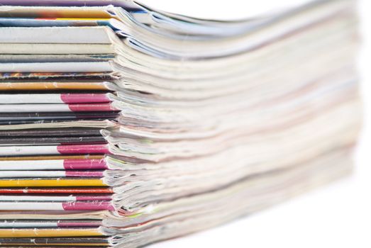 stack of colorful magazines or documents - paper edges background