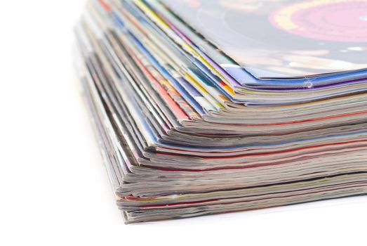 stack of colorful magazines or documents - paper edges background