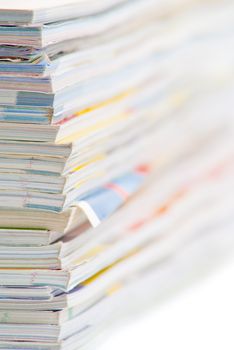 stack of colorful magazines or documents - paper edges background