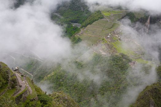 Machu Picchu is a pre-Columbian Inca site located in Peru, viewed from Wayna Picchu.