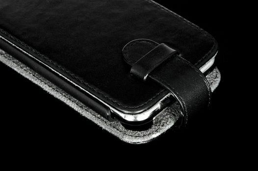 Modern smartphone in black leather case