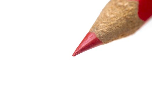 red coulor wooden sharpened  pencil over white background