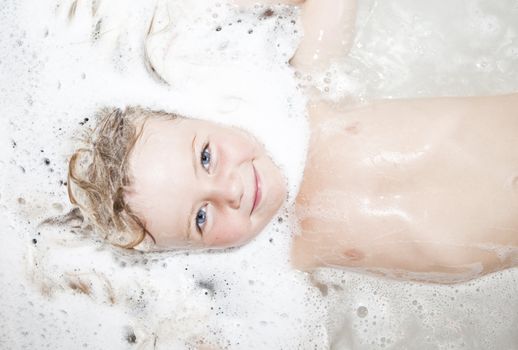 Close up of a girl in bubble bath