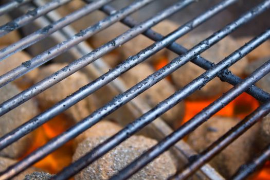 Coal grill closeup photograph, perfect glow to get started with the food.