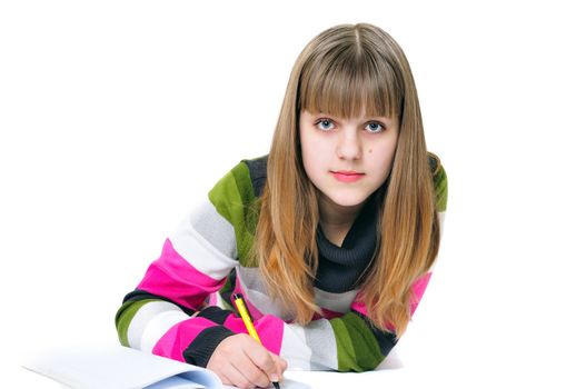 writing laying sweet teen girl over the white


