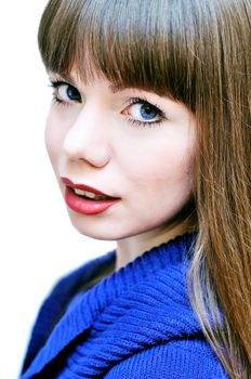 face of blue-eyed beautiful girl wearing sweater