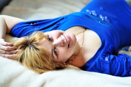 attractive forty years  woman  laying on the bed