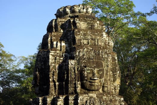 View details of a multifaceted visages tower of Bayon Temple in Angkor.