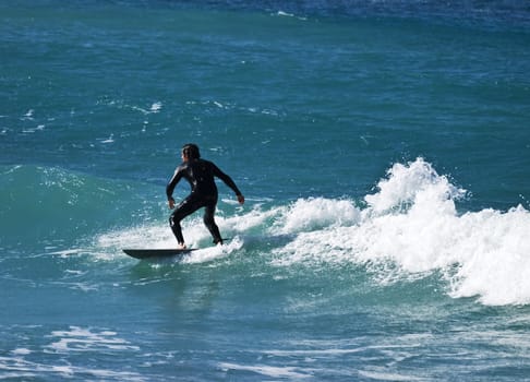 Surfing the waves is a very rare event in Malta