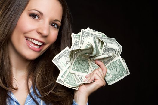 Beautiful smiling woman holding money