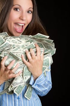 Beautiful excited woman holding money