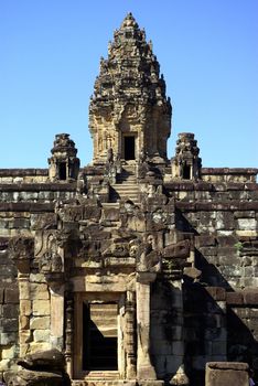 It's one stone tower of a part of an Angkor temple