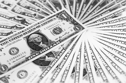 US banknotes on a fan of high-denomination european euro notes