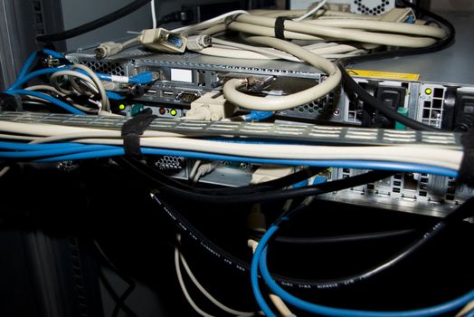 Many sorts of cables in the back of professional server