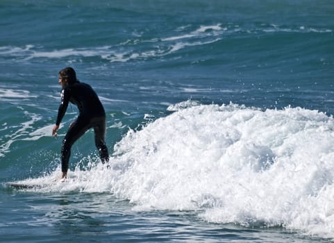 Surfing the waves is a very rare event in Malta