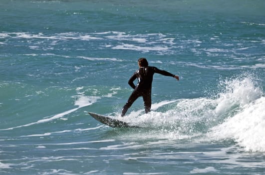 Surfing the waves is a very rare event in Malta