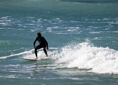 Surfing the waves is a very rare event in Malta